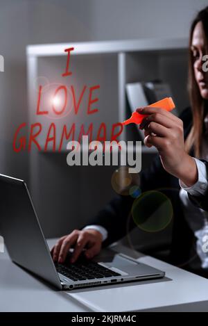 Ein Schild mit der Aufschrift „I Love Grammar“. Geschäftsvorstellung der Bewunderung des Systems und der Sprachstruktur Stockfoto