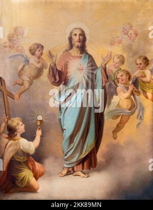 IVREA, ITALIEN - 15. JULI 2022: Gemälde des Herzens Jesu in der Kirche Chiesa di Sant Ulderico von Giovanni Stornone (1897). Stockfoto