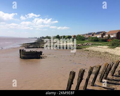 Die Strandhäuser am Ufer an einem sonnigen Tag Stockfoto