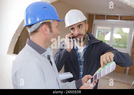 Bauarbeiter auf der Baustelle Stockfoto