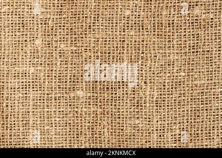 Natürlicher, strukturierter Hintergrund aus Leinenholz. Hessische Sack-Leinwand, gewebte Textur Stockfoto