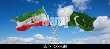 Zwei überkreuzte Flaggen Pakistan und Iran, die im Wind am bewölkten Himmel winken. Beziehungskonzept, Dialog, Reisen zwischen zwei Ländern. 3D Abbildung Stockfoto