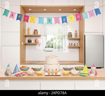 Die Küche ist für eine Geburtstagsparty mit Kuchen und Snacks auf einer Holztheke dekoriert Stockfoto