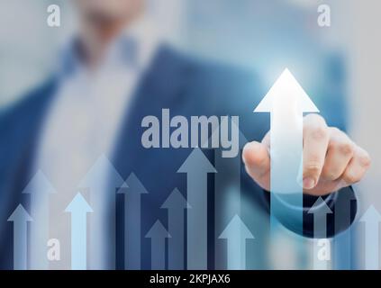 Geschäftswachstum mit Geschäftsleuten steigend Pfeil nach oben zeigt steigende Umsätze und Vorteile. Erfolgreicher Plan oder erfolgreiche Strategie, ausgezeichnete Verkaufs- oder Investitionsleistung Stockfoto