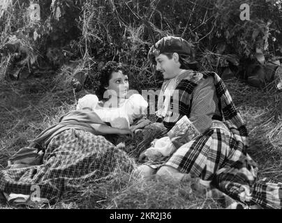 Jean Parker, Robert Donat, Drehort des britischen Films "The Ghost Goes West", United Artists, 1935 Stockfoto