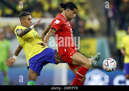 Al-Khor, Katar.. 29.. November 2022. DOHA - (l-r) Raphinha aus Brasilien, Ricardo Rodriguez aus der Schweiz während des FIFA Weltmeisterschafts-G-Spiels zwischen Brasilien und der Schweiz im 974 Stadium am 28. November 2022 2022 in Doha, Katar. AP | niederländische Höhe | MAURICE OF STONE Credit: ANP/Alamy Live News Stockfoto