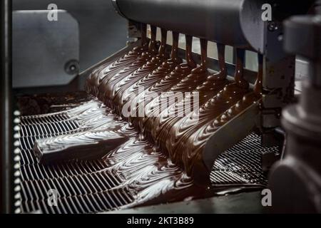 Süßigkeitenriegel mit flüssiger Schokolade in der Hershey Chocolate Factory, Hershey PA, USA Stockfoto