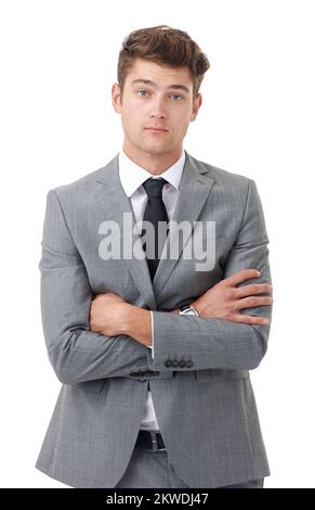 Er ist ein junger und selbstbewusster Geschäftsmann. Ein gutaussehender junger Geschäftsmann, isoliert auf Weiß. Stockfoto