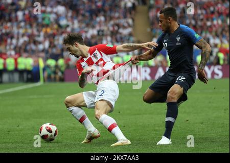 15.07.2018. Moskau, Russland - Fußball-Weltmeisterschaft 2018 , Finale, Kroatien - Frankreich. Sime Vrsaljko, Corentin Tolisso. Foto: Igor Kralj/PIXSELL Stockfoto