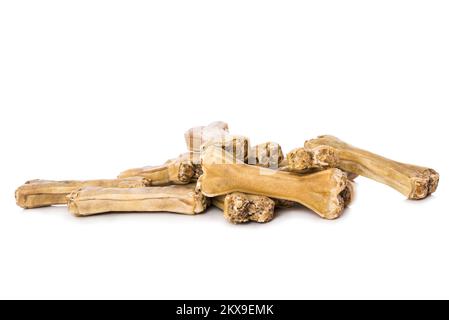 Knochenfutter für Hunde, isoliert auf weiß Stockfoto