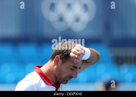 Ivan Dodig aus Kroatien reagiert während seines Männer-Doubles-Quaterfinalspiels mit Marin Cilic aus Kroatien gegen Andy Murray und Joe Salisbur aus Großbritannien am 5. Tag der Olympischen Spiele 2020 in Tokio am 28. Juli 2021 im Ariake Tennis Park in Tokio, Japan. Foto: Igor Kralj/PIXSELL Stockfoto