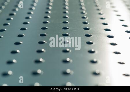 Eine abstrakte Metallstruktur mit erhabenen Unebenheiten Stockfoto