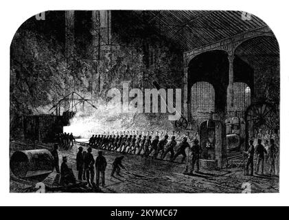 Rollende Rüstungsplatte für Royal Navy Schiffe im Atlas Stahlwerk in Sheffield, England, 1861. Früher bekannt als die Werke der Königin, wurden sie 1856 von John Brown gekauft und in einen Teil der Firth-Brown Industriegruppe umbenannt, die Pionierarbeit bei der Herstellung von billigem Schüttstahl in Großbritannien leistete und Stahlschienen und Panzerplatten herstellte. Stockfoto