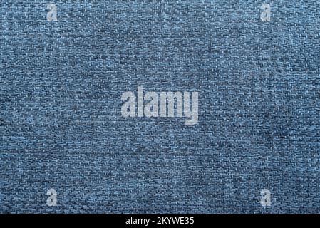 Nahaufnahme lange und breite Textur aus naturblauem Stoff oder Stoff in hellblauer Farbe. Gewebestruktur aus natürlichem Baumwolle- oder Leinentextil. Blaues c Stockfoto