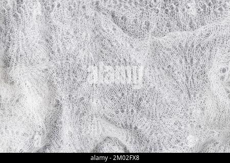 Gestrickte wollene Spitze Textur Hintergrund. Abstrakter Hintergrund mit Platz zum Kopieren für Design. Stockfoto