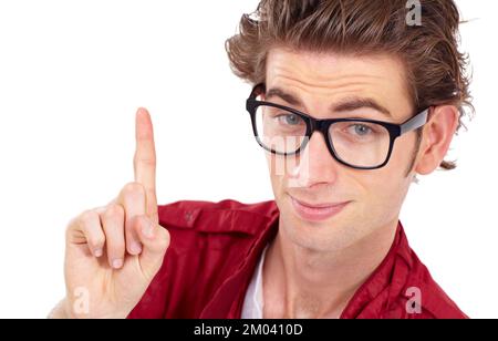 Eureka. Ein hübscher junger Mann, der mit dem Finger in die Luft zeigt und in die Kamera lächelt. Stockfoto