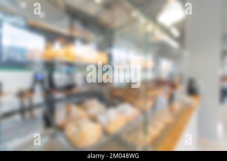 Abstrakte Unschärfe und Unschärfe-Einkaufszentrum im Inneren des Kaufhauses für den Hintergrund. Wände des Ladens moderner Vintage Loft in grauem Stil. Perfekt für Stockfoto