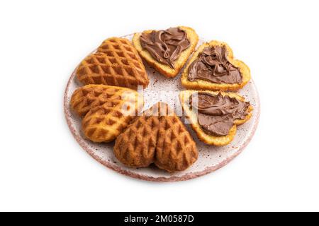 Hausgemachte Waffel mit Schokoladenbutter isoliert auf weißem Hintergrund. Seitenansicht, Nahaufnahme. Stockfoto