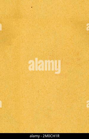 Scannen von altem Papier mit hohem Kontrast. Textur und kleine Flecken sind sichtbar. Bedeutet als gelber Hintergrund Stockfoto