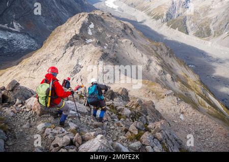 Wanderer auf dem Ball Pass geführte Wanderung in Mount Cook Neuseeland Stockfoto