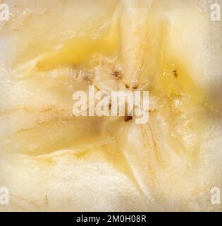 Bananentextur als Hintergrund. Nahaufnahme einer Banane. Makrofoto. Stockfoto