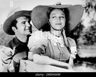 John Loder, Anne Nagel, am Set des Films, „Diamond Frontier“, Universal Pictures, 1940 Stockfoto