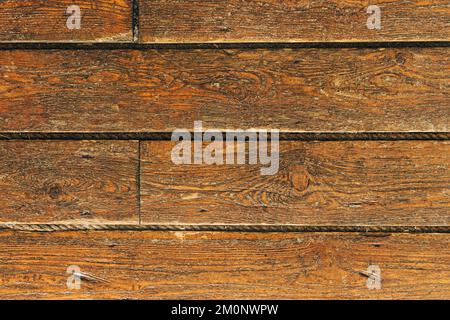 Alter Holzboden als Hintergrund. Braune Holzplanken im Vintage-Stil Stockfoto