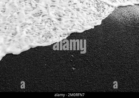 schwarzer Strand Stockfoto