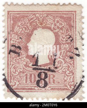 ÖSTERREICH — 1858: Eine rote Briefmarke mit 10 Kreuzer, die ein geprägtes Porträt des jungen österreichischen Monarchen-Kaisers Franz Josef darstellt. Franz Joseph I oder Franz Joseph I war Kaiser von Österreich, König von Ungarn und die anderen Staaten der Habsburger Monarchie vom 2. Dezember 1848 bis zu seinem Tod am 21. November 1916. Zu Beginn seiner Herrschaft wurden seine Reiche und Gebiete als österreichisches Reich bezeichnet, aber 1867 als zweifache Monarchie des österreichisch-ungarischen Reiches wiederaufgebaut. Vom 1. Mai 1850 bis zum 24. August 1866 war Franz Joseph auch Präsident des Deutschen Bundes Stockfoto