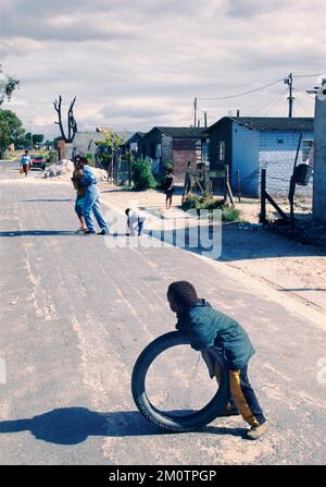 Das tägliche Leben auf einer Straße im südafrikanischen Soweto-Township Stockfoto