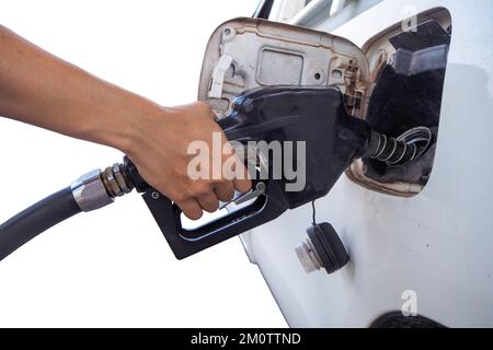 Hand mit orangefarbenem und schwarzem Ölspender Stockfoto