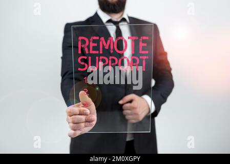 Schreiben mit Anzeige von Text Remote Support. Word für die Unterstützung von Endbenutzern bei der Remote-Lösung von Computerproblemen Stockfoto