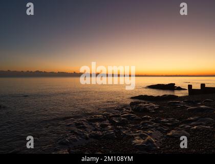 Sonnenuntergang - St. Leonards am Strand am Meer. UK Stockfoto