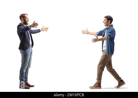 Zwei männliche Freunde treffen sich isoliert auf weißem Hintergrund Stockfoto