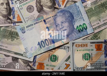 Südafrikanische Rands- und US-Dollar-Banknoten Hintergrund Stockfoto