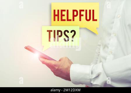Textzeichen mit hilfreichen Tipps. Ratschläge zu Geschäftsideen, die als hilfreiches Wissen im Leben dienen Stockfoto
