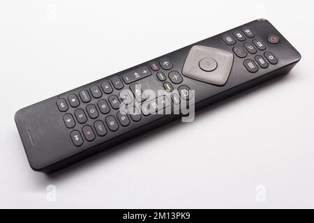Tv-Fernbedienung auf weißem Hintergrund Stockfoto