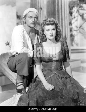 MAUREEN O'HARA UND DOUGLAS FAIRBANKS JR. In SINDBAD, DEM SEEMANN (1947) unter der Leitung VON RICHARD WALLACE. Kredit: RKO/Album Stockfoto