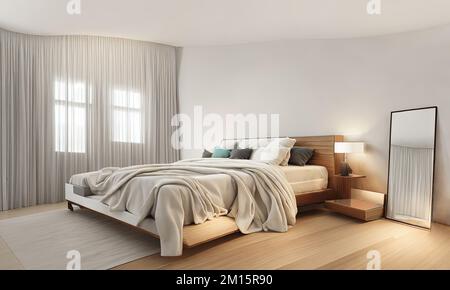 Ungemachtes Bett mit grauer Decke und vielen Kissen nahe der Wand in einem minimalistischen Schlafzimmer Stockfoto