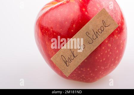 Zurück zum Thema Schule mit einem roten Apfel Stockfoto