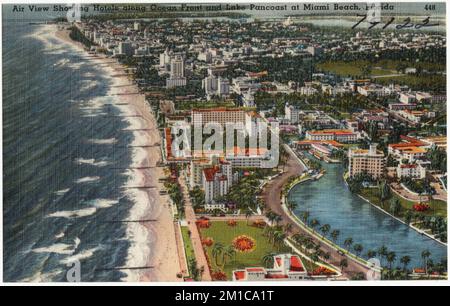 Luftansicht mit Hotels entlang der Küste und Lake Pancoast in Miami Beach, Florida , Strände, Hotels, Tichnor Brothers Collection, Postkarten der Vereinigten Staaten Stockfoto