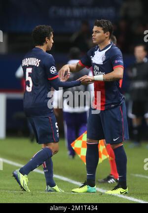 20131105 – PARIS, FRANKREICH: Marquinhos von PSG und Thiago Silva von PSG, dargestellt während des Spiels zwischen der französischen Mannschaft PSG (Paris Saint-Germain) und dem belgischen RSC Anderlecht, viertes Spiel der Champions League Group in Gruppe C, Dienstag, 05. November 2013, im Parc des Princes in Saint-Cloud, Paris. BELGA PHOTO VIRGINIE LEFOUR Stockfoto