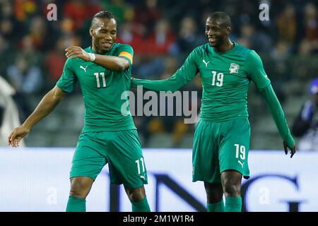 Didier Drogba an der Elfenbeinküste feiert das 2-1. Tor mit Yaya Toure (R) an der Elfenbeinküste bei einem freundlichen Fußballspiel zwischen der belgischen Nationalmannschaft Rote Teufel und Elfenbeinküste am Mittwoch, den 05. März 2014 in Brüssel. Stockfoto