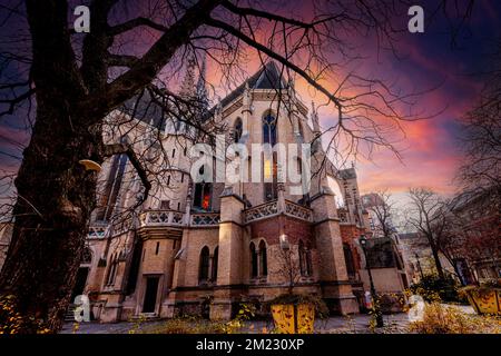 St. Othmar Church at sunset in Vienna, Austria. Church mysterious atmosphere in Vienna. Stockfoto