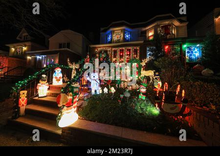 Bears, elves, wooden soldiers and colorful lights look so festive outside a home in the Dyker Heights section of Brooklyn, New York on Monday, Dec. 12 Stock Photo