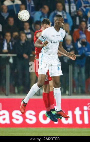 Oostende's Zarko Tomasevic and Gent's Kalifa Coulibaly fight for the ball during a soccer game between KV Oostende and KAA Gent, the quarter-final of the Croky Cup competition, Wednesday 14 December 2016 in Oostende. BELGA PHOTO KURT DESPLENTER Stock Photo