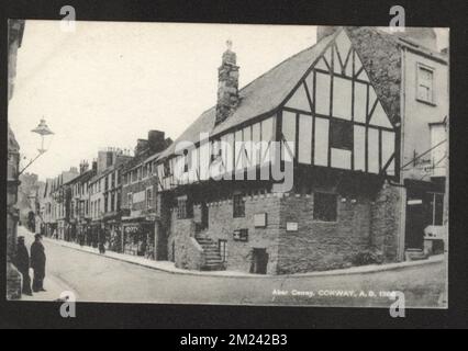 Aber Conwy, Conway real photograph postcard showing the High street in the late 19th century and old listed building circa 1300 Stockfoto