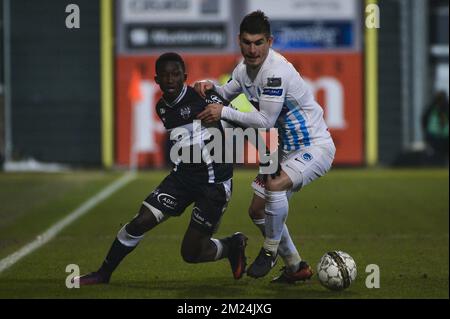 Eupen's Lazare Amani and Genk's Ruslan Malinovsky pictured during the Jupiler Pro League match between KAS Eupen and RC Genk, in Eupen, Saturday 21 January 2017, on day 22 of the Belgian soccer championship. BELGA PHOTO NICOLAS LAMBERT Stock Photo