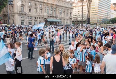 Argentine football fans on 9th July Avenue, Buenos Aires, Argentina celebrate their national team reaching the final of the FIFA World,Cup Stock Photo
