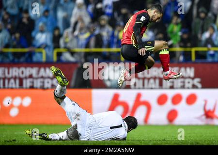 Bosnia's goalkeeper Asmir Begovic and Belgium's Eden Hazard pictured during a soccer game between Bosnia and Herzegovina and Belgian national team Red Devils, in Sarajevo, Bosnia and Herzegovina, Saturday 07 October 2017, game 9 in Group H of the qualifications for the 2018 World Cup. BELGA PHOTO DIRK WAEM Stock Photo